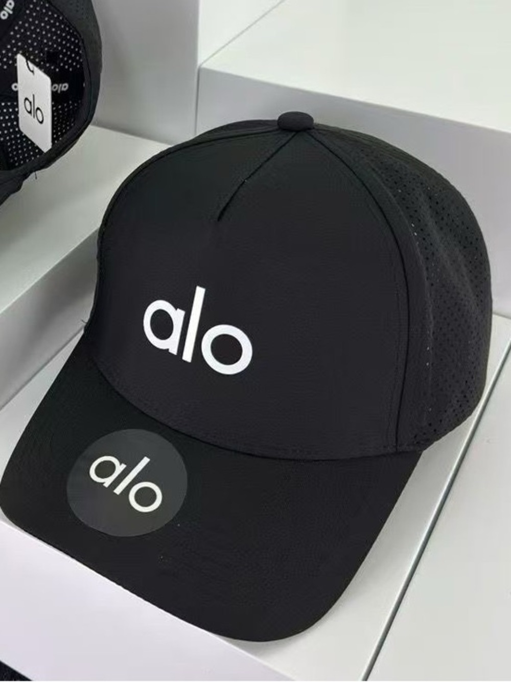 ALO Yoga Black Cap with White Logo